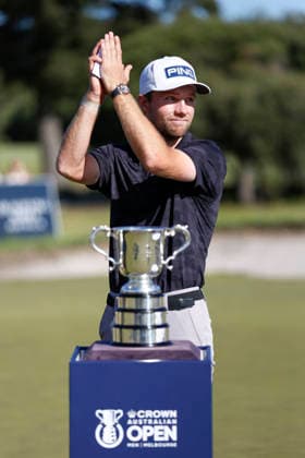 December 7, 2025, Melbourne, Australia: Rasmus Neergaard-Petersen of Denmark is seen near the Australian Open Golf trophy. The 2025 Australian Open concluded with Denmark™s Rasmus Neergaard-Petersen securing the championship at 15-under after a tense final round at The Australian Golf Club. The tournament delivers a dramatic finish, with top international contenders pushing the leaderboard to the final holes. Large crowds gathered across the course as fans watch one of Australia™s premier golf events come to a close for the year. Melbourne Australia - ZUMAs197 20251207_aaa_s197_099 Copyright: xYexMyoxKhantx