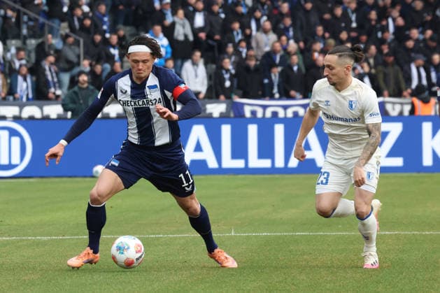 DEU, DFL, 2 FBL, Hertha BSC vs 1 FC Magdeburg, 07 12 2025, Berliner Olympiastadion, Berlin, DEU, DFL, 2 FBL, Hertha BSC vs 1 FC Magdeburg, im Bild Fabian Reese Hertha BSC Berlin 11 , Baris Atik 1 FC Magdeburg 23 DFL regulations prohibit any use of Photographs as image sequences and or quasi video nordphotoxGmbHx xEngler nph00076
