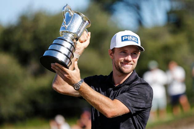 December 7, 2025, Melbourne, Australia: Rasmus Neergaard-Petersen of Denmark lifts the trophy after winning the Australian Open Golf tournament. The 2025 Australian Open concluded with Denmark™s Rasmus Neergaard-Petersen securing the championship at 15-under after a tense final round at The Australian Golf Club. The tournament delivers a dramatic finish, with top international contenders pushing the leaderboard to the final holes. Large crowds gathered across the course as fans watch one of Australia™s premier golf events come to a close for the year. Melbourne Australia - ZUMAs197 20251207_aaa_s197_106 Copyright: xYexMyoxKhantx