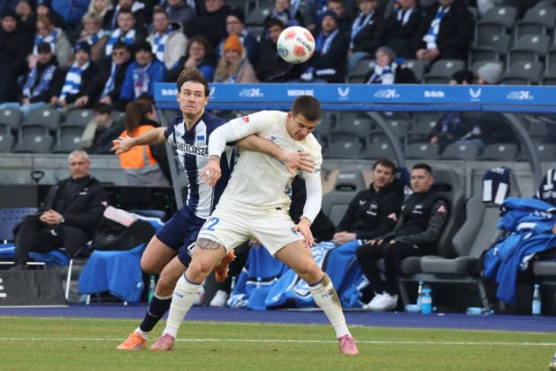 DEU, DFL, 2 FBL, Hertha BSC vs 1 FC Magdeburg, 07 12 2025, Berliner Olympiastadion, Berlin, DEU, DFL, 2 FBL, Hertha BSC vs 1 FC Magdeburg, im Bild Linus Gechter Hertha BSC Berlin 44 , Mateusz Zukowski 1 FC Magdeburg 22 DFL regulations prohibit any use of Photographs as image sequences and or quasi video nordphotoxGmbHx xEngler nph00076