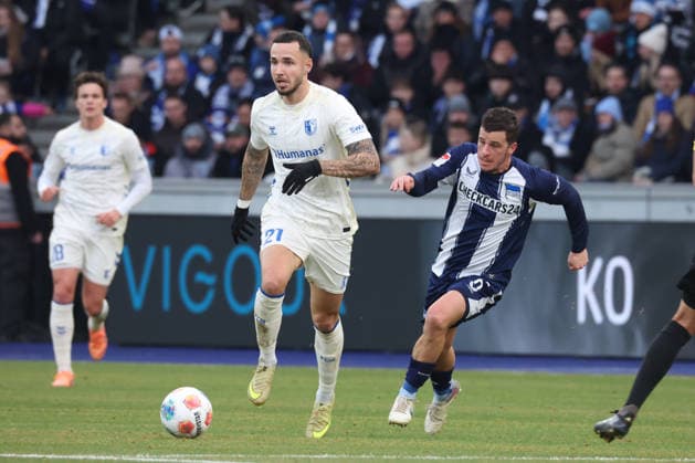 DEU, DFL, 2 FBL, Hertha BSC vs 1 FC Magdeburg, 07 12 2025, Berliner Olympiastadion, Berlin, DEU, DFL, 2 FBL, Hertha BSC vs 1 FC Magdeburg, im Bild Diego Demme Hertha BSC Berlin 6 , Falko Michel 1 FC Magdeburg 21 DFL regulations prohibit any use of Photographs as image sequences and or quasi video nordphotoxGmbHx xEngler nph00076