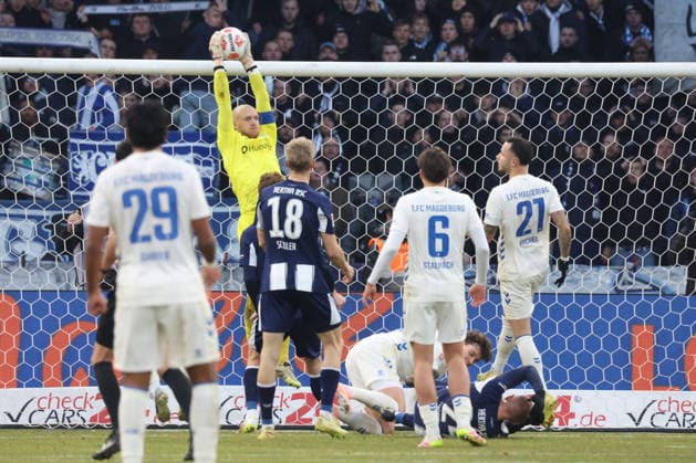 DEU, DFL, 2 FBL, Hertha BSC vs 1 FC Magdeburg, 07 12 2025, Berliner Olympiastadion, Berlin, DEU, DFL, 2 FBL, Hertha BSC vs 1 FC Magdeburg, im Bild Dominik Reimann 1 FC Magdeburg 1 DFL regulations prohibit any use of Photographs as image sequences and or quasi video nordphotoxGmbHx xEngler nph00076