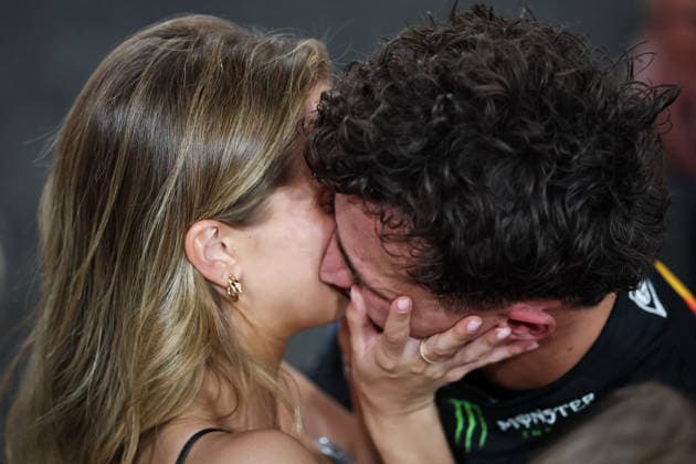 ABU DHABI, UNITED ARAB EMIRATES - DECEMBER 7: Lando Norris driving McLaren MCL39 kisses girlfriend Magui Corceiro after finishing third and thus becoming F1 World Champion 2025 during the F1 Grand Prix of Abu Dhabi at Yas Marina Circuit on December 4, 2025 in Abu Dhabi, United Arab Emirates. (Photo by Paddocker)  Copyright: xQIANxJUNxMotorsportxMedia Paddocx Sportspressphoto_SPR71647