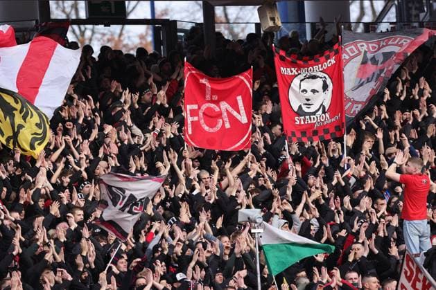 07 12 2025 Soccer Season 2025 2026 2 Soccer Bundesliga 15 Matchday 1 FC Nürnberg FCN Club SpVgg Greuther Fürth Kleeblatt Derby Frankenderby Sportfoto Zink DaMa xdaxmax DFL regulations prohibit any use of photographs as image sequences and or quasi video only for editorial use Symbolbild Symbolfoto Feature Impression Clubfan Clubfans FCN Fans Fans cheer on Team Team des FCN
