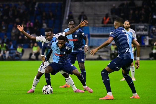 FOOTBALL : Le Havre vs PFC - Ligue 1 - 07 12 2025 Moses Simon ( 27 - PFC ) and Godson Kyeremeh ( 11 - Le Havre ) during the Ligue 1 match between Havre AC and Paris FC at Stade Oceane on December 7, 2025 in Le Havre, France. ( Photo by Federico Pestellini PsnewZ ) - Le HavreFrance  Copyright: xFedericoxPestellinix