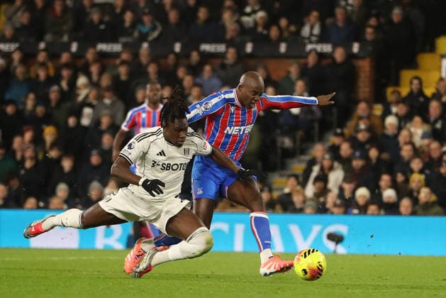 7th December 2025; Craven Cottage, Fulham, London, England; Premier League Football, Fulham versus Crystal Palace; Jean-Philippe Mateta of Crystal Palace shoots under pressure from Calvin Bassey of Fulham  KatiexChan