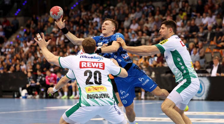 BAU 07 12 2025 Stuttgart Handball TVB Stuttgart vs SC DHfK Leipzig, f l Eilliam Bogojevic Leipzig , Simone Mengon TVB , Marko Mamic Leipzig