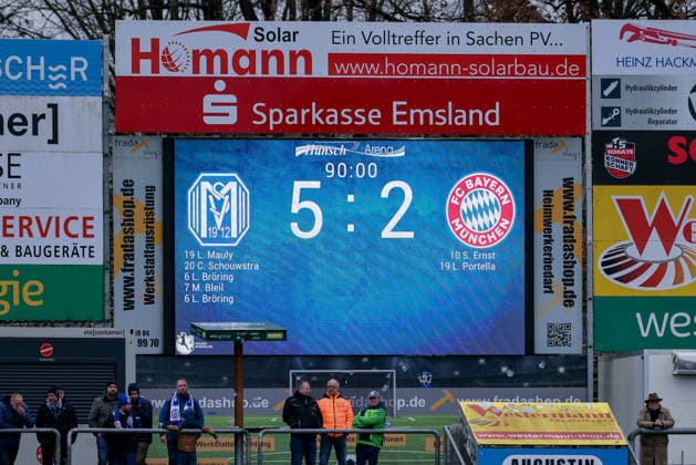 The scoreboard shows the score of 5 2, result, intermediate result, final result, final score, goals, video wall, video wall, display, THE DFB REGULATIONS PROHIBIT ANY USE OF PHOTOGRAPHS AS IMAGE SEQUENCES AND OR QUASI VIDEO , 07 12 2025, Meppen Germany , Football, 2 Womens Bundesliga, SV Meppen FC Bayern München II xobx
