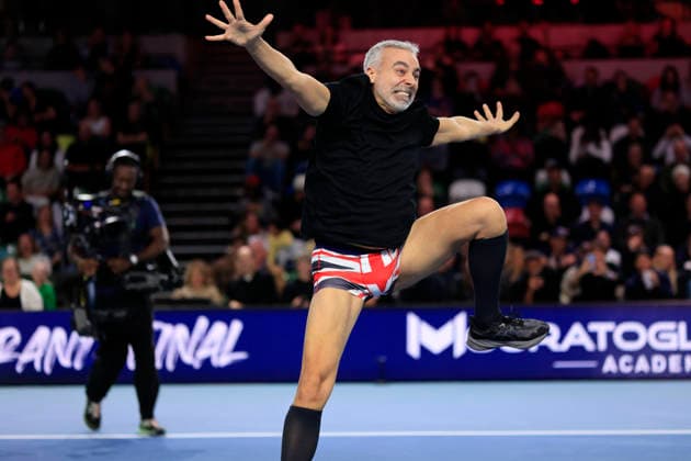 7th December 2025; Copper Box Arena, London, England; Victorian Plumbing UTS London Grand Final Tennis, Day Three; A tennis fan strips off on court during a break  HongboxChen