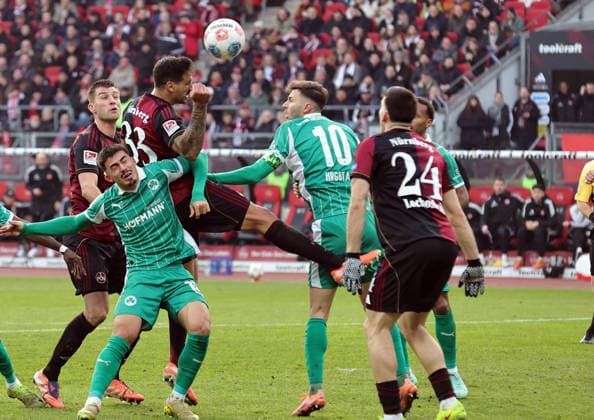 07 12 2025 Soccer Season 2025 2026 2 Soccer Bundesliga 15 Matchday 1 FC Nürnberg FCN Club SpVgg Greuther Fürth Kleeblatt Derby Frankenderby Sportfoto Zink DaMa xdaxmax DFL regulations prohibit any use of photographs as image sequences and or quasi video only for editorial use Adriano Grimaldi 33, 1 FC Nürnberg FCN with header gg Branimir Hrgota 10, SpVgg Greuther Fürth