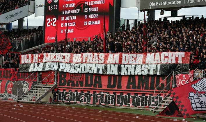 07 12 2025 Soccer Season 2025 2026 2 Soccer Bundesliga 15 Matchday 1 FC Nürnberg FCN Club SpVgg Greuther Fürth Kleeblatt Derby Frankenderby Sportfoto Zink DaMa xdaxmax DFL regulations prohibit any use of photographs as image sequences and or quasi video only for editorial use Banner Banner of the Clubfan Clubfans FCN Fans Fans Fans Uli H Uli Hoeneß Lieber Ultras an der Macht als ein Präsident im Knast