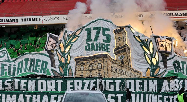07 12 2025 Soccer Season 2025 2026 2 Soccer Bundesliga 15 Matchday 1 FC Nürnberg FCN Club SpVgg Greuther Fürth Kleeblatt Derby Frankenderby Sportfoto Zink DaMa xdaxmax DFL regulations prohibit any use of photographs as image sequences and or quasi video only for editorial use Symbolbild Symbol photo Feature Impression Choreography of the cloverleaf fans before the start of the match Pyrotechnics Pyro Bengal torches Bengal torches Smoke