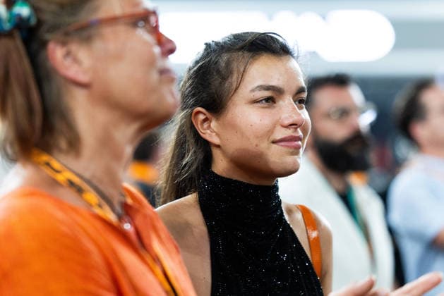 December 7, 2025, Abu Dhabi, Abu Dhabi, United Arab Emirates: FLO NORRIS (Lando Norris sister) and CISCA NORRIS on the grid under the podium after the end of the race when Lando Norris won the Drivers Championship on Sunday at the Formula 1 Etihad Airways Abu Dhabi Prix 2025 at the Yas Marina Circuit in Abu Dhabi, United Arab Emirates Abu Dhabi United Arab Emirates - ZUMAr193 20251207_zsp_r193_194 Copyright: xSaraxRuffonix