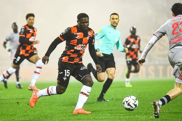 FOOTBALL : FC Lorient vs Olympique Lyonnais - Ligue 1 - JournÃ e 15 - 07 12 2025 Aiyegun Tosin (FC Lorient) LorientFrance  Copyright: xBaptistexAutissierx