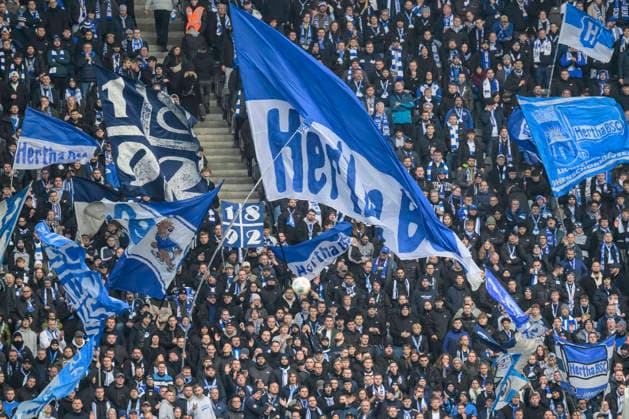 GER, Berlin, soccer, Hertha BSC vs. 1. FC Magdeburg, DFB, 2nd Bundesliga, 2025 2026 season, f.l.t.r.: fans of Hetha, the Hertha fans raise their scarves and celebrate the team, flags and banner, DFB DFL REGULATIONS PROHIBIT ANY USE OF PHOTOGRAPHS AS IMAGE SEQUENCES AND OR QUASI-VIDEO, December 7, 2025, Copyright: HMBxMedia UwexKoch