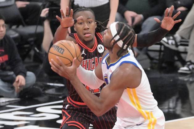 Chicago Bulls v Golden State Warrios - NBA, Basketball Herren, USA CHICAGO, ILLINOIS - DECEMBER 7 : Ayo Dosunmu (11) of Chicago Bulls in action against during their NBA regular-season game at the United Center on December 7, 2025. Jacek Boczarski Anadolu Illinois United States. Editorial use only. Please get in touch for any other usage.  Copyright: x2025xAnadoluxJacekxBoczarskix