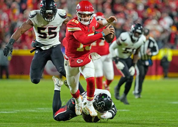 Kansas City Chiefs quarterback Patrick Mahomes (15) scrambles for a gain of 15 yards against the Texans at Arrowhead Stadium in Kansas City, Missouri on Sunday,December 7, 2025.  KCP2025120714 JONxROBICHAUD