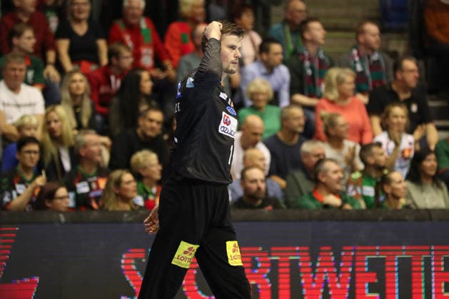 07 12 2025, xgox, Handball Daikin HBL SC Magdeburg FRISCH AUF Göppingen emspor, v l Sergey Hernandez Ferrer Magdeburg, 1 cheers over held ball, defended, held, Torhueter Magdeburg