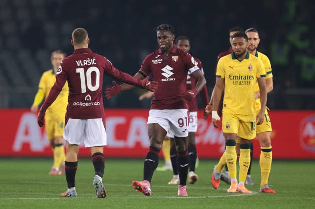 Turin, Italy, 8th December 2025. Nikola Vlasic of Torino FC celebrates with team mates after scoring a penalty to give the hosts a 1-0 lead during the Torino vs AC Milan Serie A match at Stadio Grande Torino, Turin. Picture credit should read: Jonathan Moscrop Sportimage EDITORIAL USE ONLY. No use with unauthorised audio, video, data, fixture lists, club league logos or live services. Online in-match use limited to 120 images, no video emulation. No use in betting, games or single club league player publications. SPI_015_JM_TORO_MILAN SPI-4323-0015