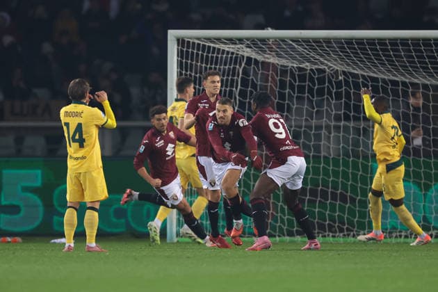 Turin, Italy, 8th December 2025. Nikola Vlasic of Torino FC celebrates with team mates after scoring a penalty to give the hosts a 1-0 lead during the Torino vs AC Milan Serie A match at Stadio Grande Torino, Turin. Picture credit should read: Jonathan Moscrop Sportimage EDITORIAL USE ONLY. No use with unauthorised audio, video, data, fixture lists, club league logos or live services. Online in-match use limited to 120 images, no video emulation. No use in betting, games or single club league player publications. SPI_019_JM_TORO_MILAN SPI-4323-0019