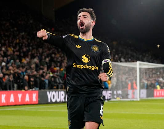 Wolverhampton, England, 8th December 2025. Bruno Fernandes of Manchester United, ManU celebrates scoring the first goal during the Wolverhampton Wanderers vs Manchester United Premier League match at Molineux, Wolverhampton. Picture credit should read: Andrew Yates Sportimage EDITORIAL USE ONLY. No use with unauthorised audio, video, data, fixture lists, club league logos or live services. Online in-match use limited to 120 images, no video emulation. No use in betting, games or single club league player publications. SPI_059_AY_Wolves_Man_Utdx SPI-4356-0061