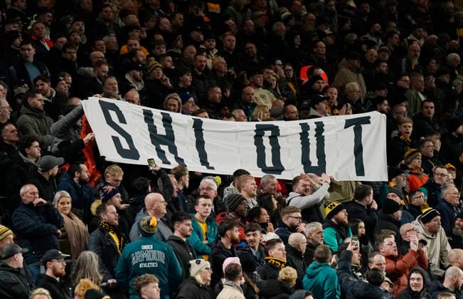 Wolverhampton, England, 8th December 2025. Wolves fans hold up a banner aimed towards the Executive chairman during the Wolverhampton Wanderers vs Manchester United, ManU Premier League match at Molineux, Wolverhampton. Picture credit should read: Andrew Yates Sportimage EDITORIAL USE ONLY. No use with unauthorised audio, video, data, fixture lists, club league logos or live services. Online in-match use limited to 120 images, no video emulation. No use in betting, games or single club league player publications. SPI_064_AY_Wolves_Man_Utd SPI-4356-0066