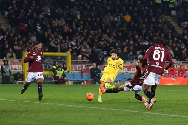 Turin, Italy, 8th December 2025. Christian Pulisic of AC Milan scores to level the game at 2-2 during the Torino vs AC Milan Serie A match at Stadio Grande Torino, Turin. Picture credit should read: Jonathan Moscrop Sportimage EDITORIAL USE ONLY. No use with unauthorised audio, video, data, fixture lists, club league logos or live services. Online in-match use limited to 120 images, no video emulation. No use in betting, games or single club league player publications. SPI_093_JM_TORO_MILAN SPI-4323-0093
