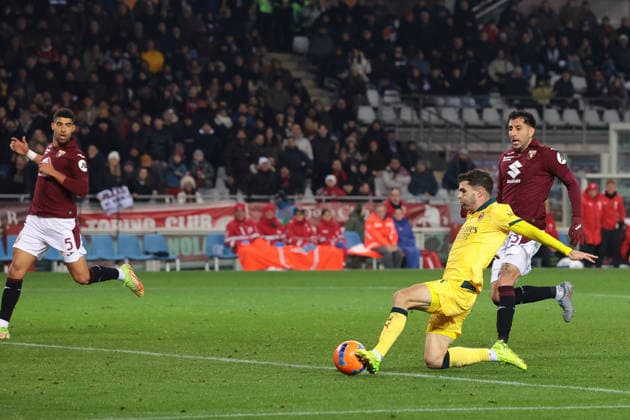 Turin, Italy, 8th December 2025. Christian Pulisic of AC Milan scores what would have been his third goal of the night, only for the American to scroe from an offside positon and subsequently be disallowed during the Torino vs AC Milan Serie A match at Stadio Grande Torino, Turin. Picture credit should read: Jonathan Moscrop Sportimage EDITORIAL USE ONLY. No use with unauthorised audio, video, data, fixture lists, club league logos or live services. Online in-match use limited to 120 images, no video emulation. No use in betting, games or single club league player publications. SPI_137_JM_TORO_MILAN SPI-4323-0137