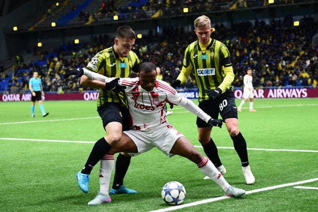 UEFA Champions League, Olympiacos FC vs Kairat Almaty - Ayoub El Kaabi of Olympiacos FC in action against Egor Sorokin of Kairat Almaty during the UEFA Champions League Phase matchday 6 soccer match between Olympiacos FC and Kairat Almaty held at Astana Arena in Astana, Kazakhstan, 9 December 2025. IMAGO ONE INCH PRODUCTIONS Astana Kazakhstan Copyright: xONExINCHxPRODUCTIONSx 6772157