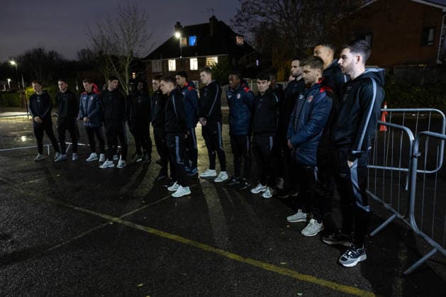 Charlton Athletic v Middlesbrough Sky Bet Championship Greg Docherty of Charlton Athletic leads during a moment of reflection at the a memorial outside the stadium for Norman Barker known as Headphones Norm before the Sky Bet Championship match at The Valley, London 09 12 2025 UK Newspapers OUT Copyright: xBenxPetersx FIL-22613-0055