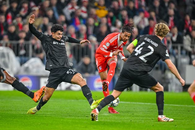 Joao Simoes Sporting CP , Michael Olise FC Bayern München and Morteb Hjulmand Sporting CP battle for the ball during the UEFA Champions League 2025 26 League Phase MD6 match between FC Bayern München and Sporting Clube de Portugal at Football Arena Munich on December 9, 2025 in Munich, Germany Photo by xxx DeFodi Images