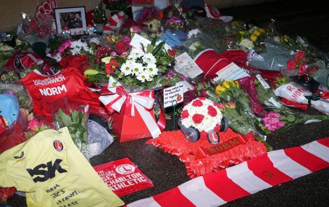 Memorial flowers for Charlton Athletic fan Norman Barker, known as Headphones Norm who died during the home match against Portsmouth causing the match to be abandoned. Charlton Athletic v Middlesbrough, Sky Bet Championship, Football, The Valley, London, UK - 09 Dec 2025London The Valley United Kingdom EDITORIAL USE ONLY No use with unauthorised audio, video, data, fixture lists, club league logos or live services. Online in-match use limited to 120 images, no video emulation. No use in betting, games or single club league player publications.  Copyright: xJedxLeicester Shutterstockx 16009821e