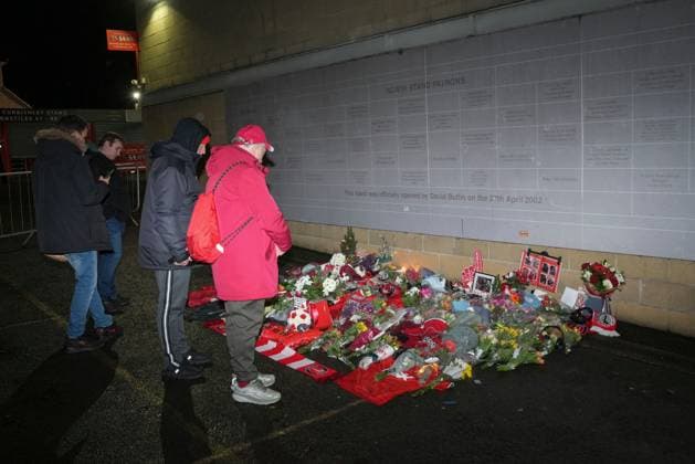Memorial flowers for Charlton Athletic fan Norman Barker, known as Headphones Norm who died during the home match against Portsmouth causing the match to be abandoned. Charlton Athletic v Middlesbrough, Sky Bet Championship, Football, The Valley, London, UK - 09 Dec 2025London The Valley United Kingdom EDITORIAL USE ONLY No use with unauthorised audio, video, data, fixture lists, club league logos or live services. Online in-match use limited to 120 images, no video emulation. No use in betting, games or single club league player publications.  Copyright: xJedxLeicester Shutterstockx 16009821c