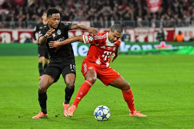 UEFA Champions League FC Bayern Munich Sporting CP 09 12 2025 MUNICH, GERMANY 09 DECEMBER in the duel Geny CATAMO Sporting CP 10 and Serge GNABRY FC Bayern Munich 7 during the match between FC Bayern Munich and Sporting Lisbon on matchday 6 of the UEFA Champions League league phase at the Allianz Arena Copyright: xBEAUTIFULxSPORTS Goldbergx