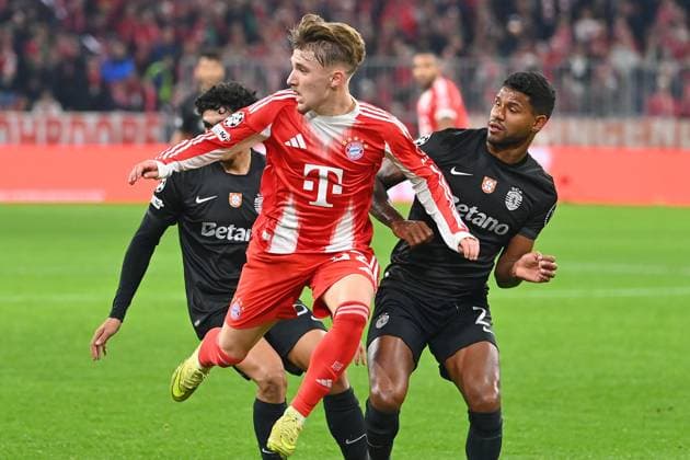 Lennart KARL Bayern Muenchen , action,duel against Matheus REIS Sporting CP Football Champions League,season 2025 26, league phase FC Bayern Muenchen Sporting CP on 09 12 2025
