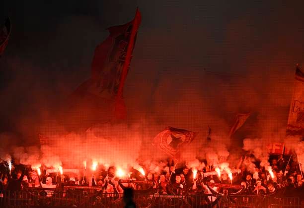 09 12 2025, Football UEFA Championsleague 2025 2026 Preliminary Round 6 Matchday, FC Bayern Munich Sporting Lisbon, in the Allianz Arena Munich The Bavarians in the South Curve have ignited Phyros DFL and DFB regulations prohibit any use of photographs as image sequences and or quasi video