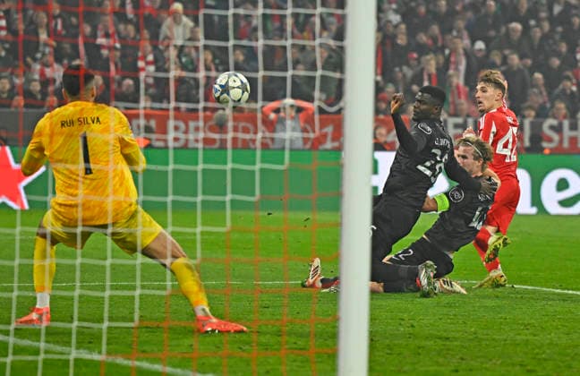 09 12 2025, Football UEFA Championsleague 2025 2026 Preliminary Round 6 Matchday, FC Bayern Munich Sporting Lisbon, at Allianz Arena Munich Lennart Karl FC Bayern Munich scores to 2 1 against goalkeeper Rui Silva Sporting Lisbon DFL and DFB regulations prohibit any use of photographs as image sequences and or quasi video