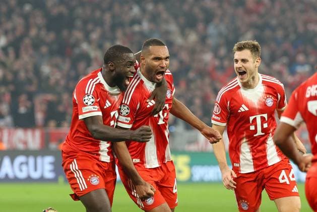 Dayot Upamecano 2 FC Bayern Muenchen , Jonathan Tah 4 FC Bayern Muenchen , Josip Stanisic 44 FC Bayern Muenchen to 3 1, FC Bayern Muenchen vs Sporting Lisbon, Football, Champions League, Matchday 6, 09 12 2025 Muenchen Bayern Germany Copyright: xkolbert-press ChristianxKolbertx