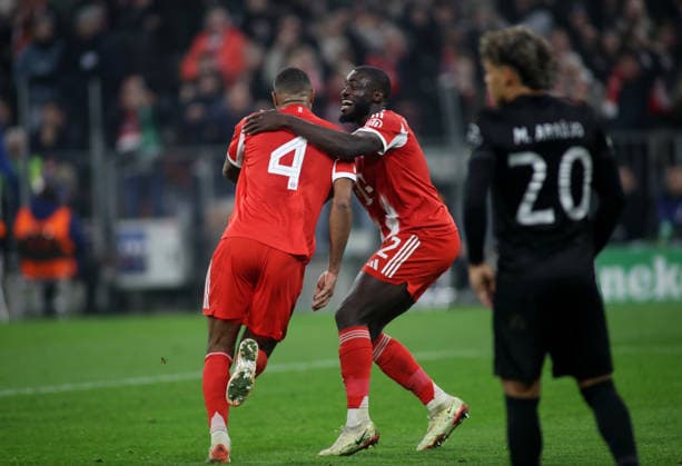Football, Men, Champions League, Season 2025 2026, FC Bayern Munich Sporting Lisbon, Matchday 6, Allianz Arena 3 1 by Jonathan Tah FC Bayern Munich , Goal, Cheering, here with Dayot Upamecano FC Bayern Munich re