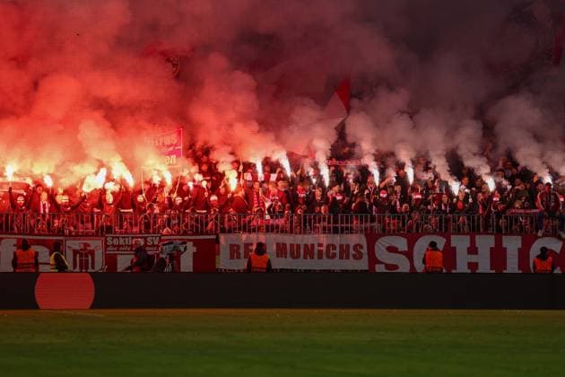 Soccer Champions League Matchday 6 FC Bayern Munich Sporting Lisbon on 09 12 2025 at the Allianz Arena in Munich Fans of FC Bayern Munich ignite Bengalos Pyro Pyrotechnics Flares Smoke bombs in the fan block xMSx