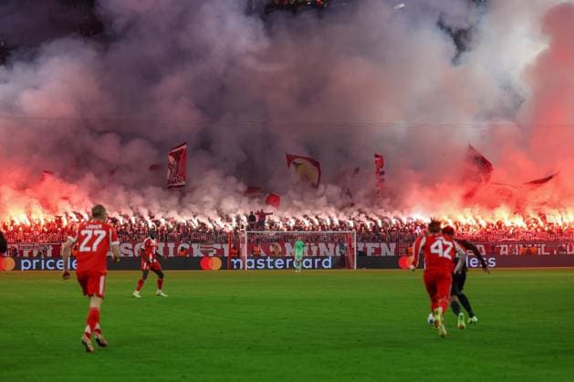 Soccer Champions League Matchday 6 FC Bayern Munich Sporting Lisbon on 09 12 2025 at the Allianz Arena in Munich Fans of FC Bayern Munich ignite Bengalos Pyro Pyrotechnics Flares Smoke bombs in the fan block xMSx