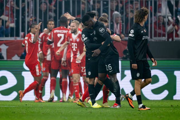 Joao Simoes Sporting Lisbon, 52 and Ousmane Diomande Sporting Lisbon, 26 served, while in the background Bayern celebrate the goal to 2 1 by Lennart Karl FC Bayern Muenchen, 42 GER, FC Bayern Muenchen vs Sporting Lisbon SCP, Football, Champions League, League Phase 6 Matchday, Season 2025 2026, 09 12 2025 DFL DFB REGULATIONS PROHIBIT ANY USE OF PHOTOGRAPHS as IMAGE SEQUENCES and or QUASI VIDEO GER, FC Bayern Muenchen vs Sporting Lisbon SCP, Football, Champions League, League Phase 6 Matchday, Season 2025 2026, 09 12 2025 Muenchen Copyright: xEibner-Pressefoto HeikexFeinerx EP_HFR