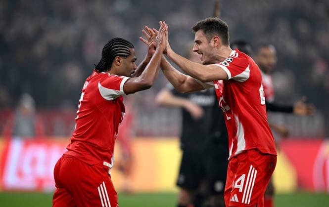FOOTBALL CHAMPIONS LEAGUE SEASON 2025 2026 Preliminary Round 6 Matchday 09 12 2025 FC Bayern Muenchen Sporting Lisbon Celebration FC Bayern Muenchen after the goal for 1 1, goal scorer Serge Gnabry with Josip Stanisic