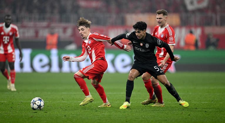 FOOTBALL CHAMPIONS LEAGUE SEASON 2025 2026 Preliminary Round 6 Matchday 09 12 2025 FC Bayern Muenchen Sporting Lisbon Lennart Karl left, FC Bayern Muenchen v Joao Simoes right, Sporting Lisbon