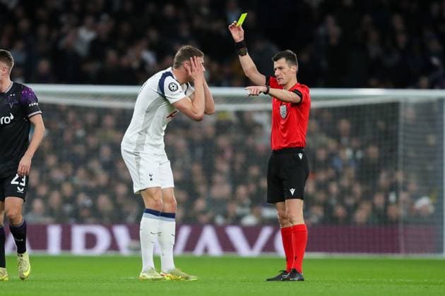 Micky van de Ven of Tottenham Hotspur receives a yellow card from the referee Tottenham Hotspur v SK Slavia Praha, Football, UEFA Champions League 2025 26 League Phase MD6, Tottenham Hotspur Stadium, London, UK, 09 12 25 Editorial use only  Copyright: xAnthonyxHanc Shutterstockx 16066670b