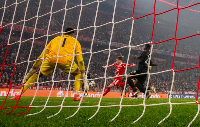 09 12 2025, Football UEFA Championsleague 2025 2026 Preliminary Round 6 Matchday, FC Bayern Munich Sporting Lisbon, at Allianz Arena Munich Lennart Karl FC Bayern Munich scores to 2 1 against goalkeeper Rui Silva Sporting Lisbon DFL and DFB regulations prohibit any use of photographs as image sequences and or quasi video