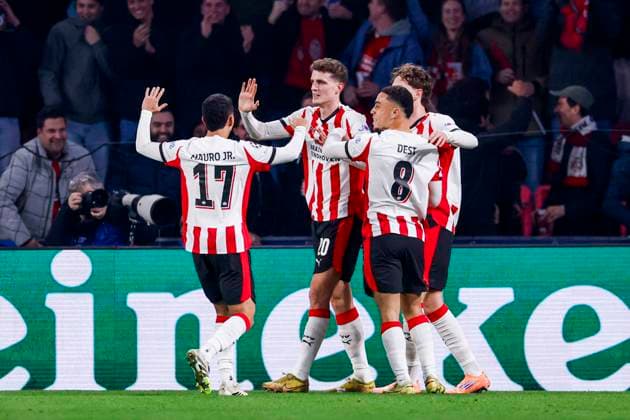 Guus Til of PSV Eindhoven celebrates with teammates after scoring his teams first goal PSV Eindhoven v Atletico de Madrid, UEFA Champions League 2025 26 League Phase MD6, PSV Eindhoven v Atletico de Madrid, PSV Stadion, December 9, 2025, Eindhoven, Netherlands.