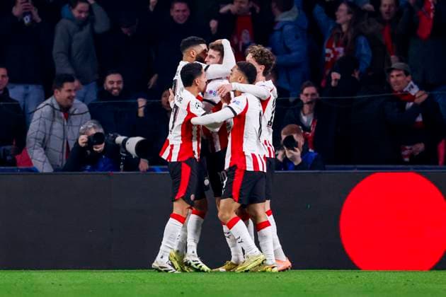 Guus Til of PSV Eindhoven celebrates with teammates after scoring his teams first goal PSV Eindhoven v Atletico de Madrid, UEFA Champions League 2025 26 League Phase MD6, PSV Eindhoven v Atletico de Madrid, PSV Stadion, December 9, 2025, Eindhoven, Netherlands.