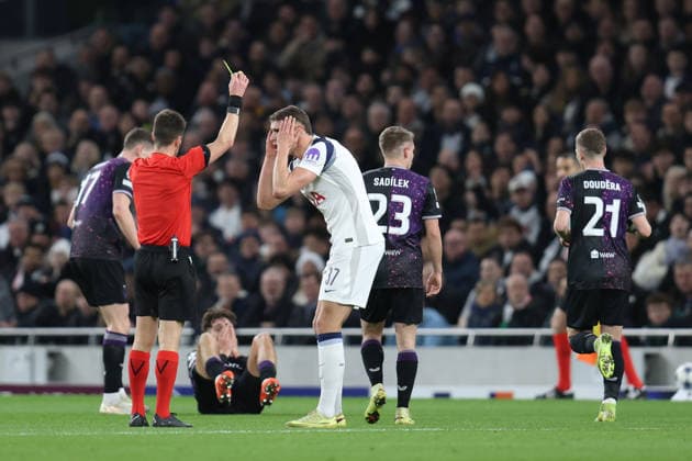 Micky van de Ven of Tottenham Hotspur is given a yellow card by match referee Benoit Bastien during the UEFA Champions League match between Tottenham Hotspur and Slavia Praha at Tottenham Hotspur Stadium in London, England (Photo by Alexander Canillas Sports Press Photo) Copyright: xAlexanderxCanillas SPPx Sportspressphoto_SPR72464