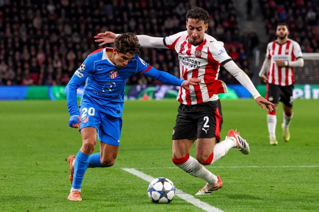 2025-12-09 PSV Eindhoven v Atletico Madrid - UEFA Champions League 2025 26 League Phase MD6 EINDHOVEN, NETHERLANDS - DECEMBER 9: Giuliano Simeone of Atletico Madrid battles for possession with Anass Salah-Eddine of PSV Eindhoven during the UEFA Champions League 2025 26 League Phase MD6 match between PSV Eindhoven and Atletico Madrid at Phillips Stadion on December 9, 2025 in Eindhoven, Netherlands. Eindhoven Phillips Stadion Netherlands Content not available for redistribution in The Netherlands directly or indirectly through any third parties. Copyright: xBenxGalx